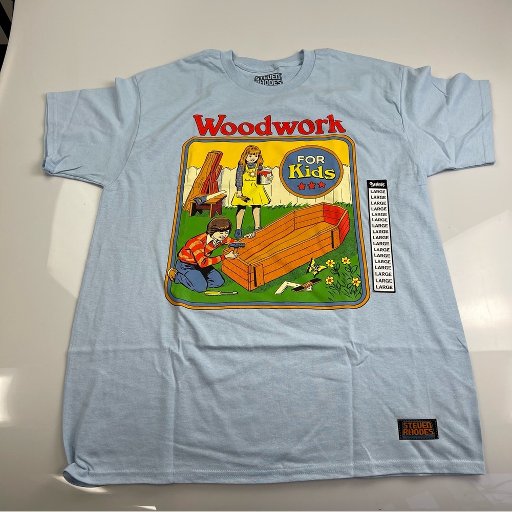 Spencer's Light Blue "Woodwork For Kids" Graphic Tee